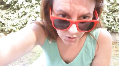Dirty piss-filled diaper shown in a public garden under a white skirt