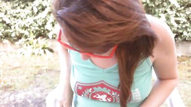 Dirty piss-filled diaper shown in a public garden under a white skirt