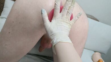 Fucked her boyfriend with a big butt plug in the ass.