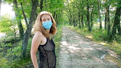 I walk among the trees in my mesh dress on my naked body
