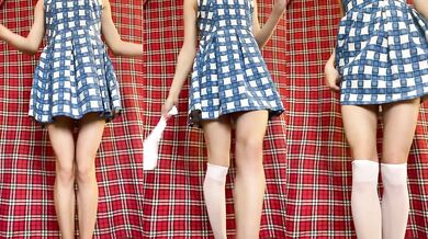 Freshman girl in a cute dress and white knee socks