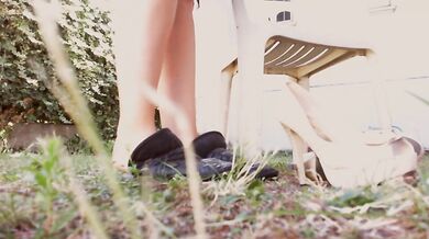 A beautiful giantess makes you her big feet in the garden her all the time!