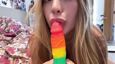 beauty fucks herself with a dildo