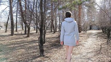 I walk bottomless next to a busy street