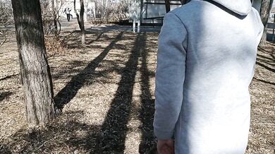 I walk bottomless next to a busy street