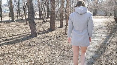I walk bottomless next to a busy street