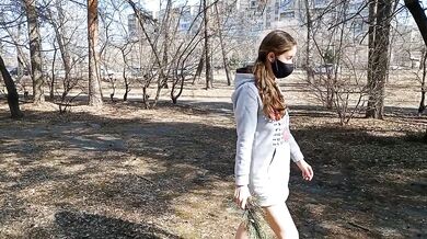 I walk bottomless next to a busy street