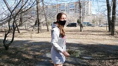 I walk bottomless next to a busy street