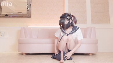 Japanese schoolgirl masturbates while riding a dildo