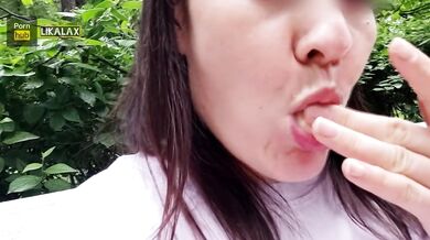 Pretty woman fucked herself with a banana in the park, and then ate it in front of people