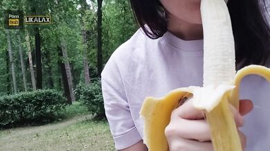 Pretty woman fucked herself with a banana in the park, and then ate it in front of people