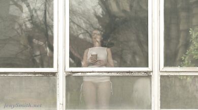 Jeny Smith teasing the strangers thru the window