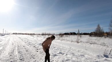 Russian Nude Girl on the Road and Winter village