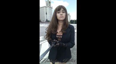 girl in a transparent dress walks near the Moscow University (part 1)