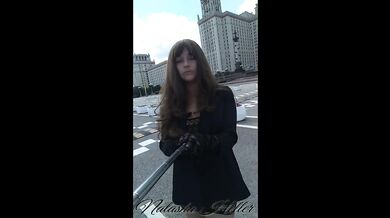 girl in a transparent dress walks near the Moscow University (part 1)