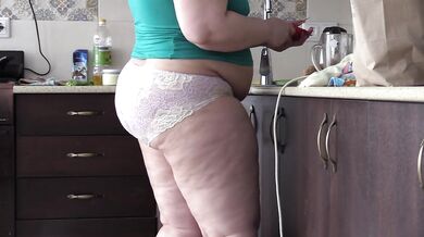 bbw housewife with big belly and big ass in the kitchen in panties