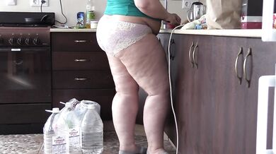 bbw housewife with big belly and big ass in the kitchen in panties