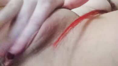 Redhead slut masturbates her wet pussy close-up