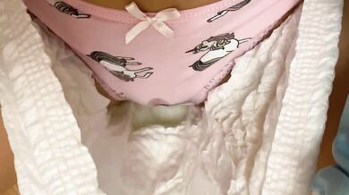 By the Christmas tree pissing in cute panties under a diaper