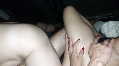 The back seat turns into a threesome bed with two hot wives