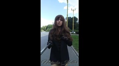 girl in a transparent dress walks near the Moscow University (part 2)