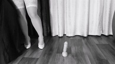 Booty blonde in pearl panties rides a dildo