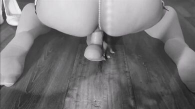 Booty blonde in pearl panties rides a dildo