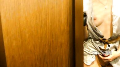 Slutty bitch can't hold back her lust and plays with pussy in fitting room, public masturbation