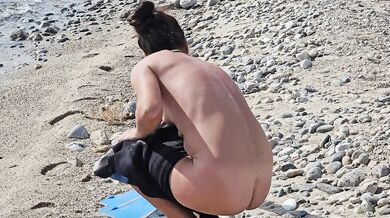 Hot Diver Flashing on Public Beach