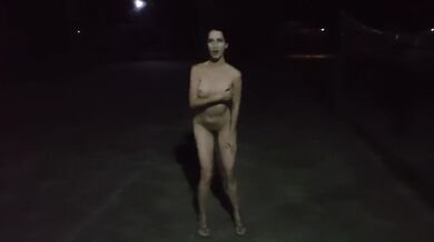 The girl is completely undressed on the street