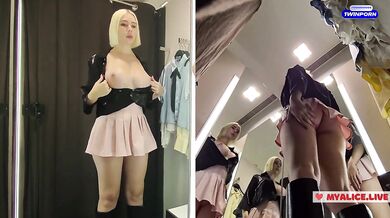 Young blonde shows big tits in the dressing room. See throuhg clothes
