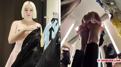 Young blonde shows big tits in the dressing room. See throuhg clothes