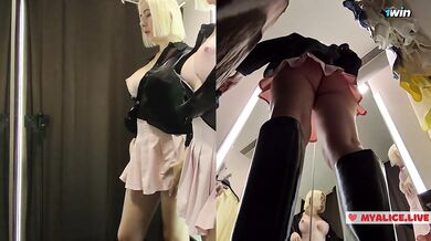Young blonde shows big tits in the dressing room. See throuhg clothes