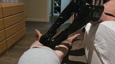 Milf stepping on her slave's cock with boots and using stockings as a condom