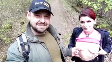 Sucking and fucking in the park on the path with a red beauty
