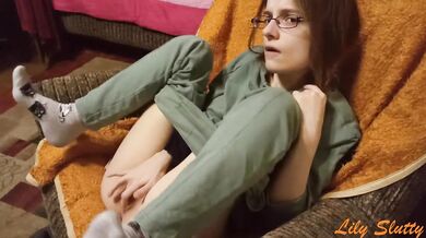 Cute teen girl masturbates while her parents are in the next room
