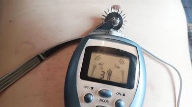 BDSM electro stimulation of dick in chastity belt, play with nipples.