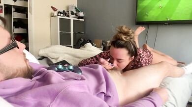 He tries to play FIFA while she plays with his COCK!!