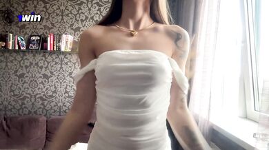 A bitch in a white dress with heels wants sex