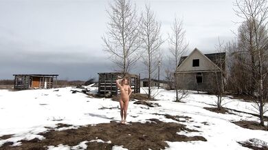 Naked girl in the spring village