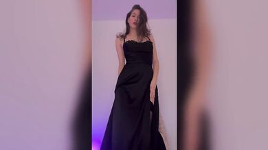 This Beauty in a Dress Gets Excited as she Dances and then can't Stop