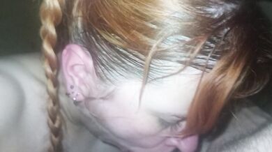 Blowjob from a red-haired beauty in a sauna