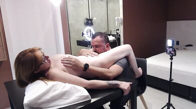 Fucking and sucking the married woman on the table.