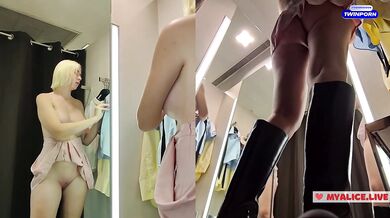 Upskirt view on Blonde with big boobs tries on transparent clothes. Video from public locker room