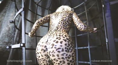 Latex cat in the cage