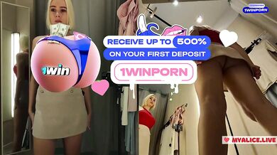Young blonde with big tits tries on transparent clothes. Blonde MyCandyAlice shows tits in public