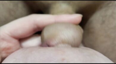 Playing with my strange, small penis. She seems to like it. I'm masturbating with my feet.