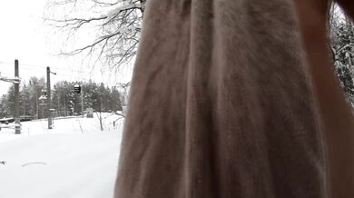 Russian Nude Girl walking on the winter forest