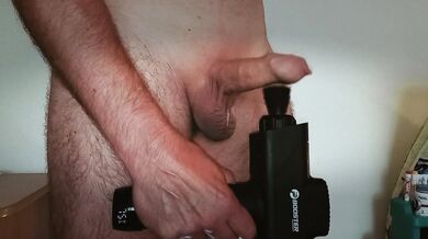 I squeeze sperm from an uncircumcised penis with a sports vibrator!