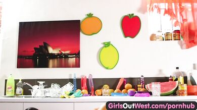 Girls Out West - Busty hairy girl masturbates in the kitchen